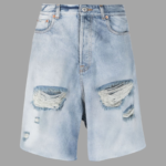 VETEMENTS ripped-detailed denim shorts