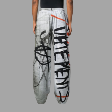 Graffiti logo-print track pants